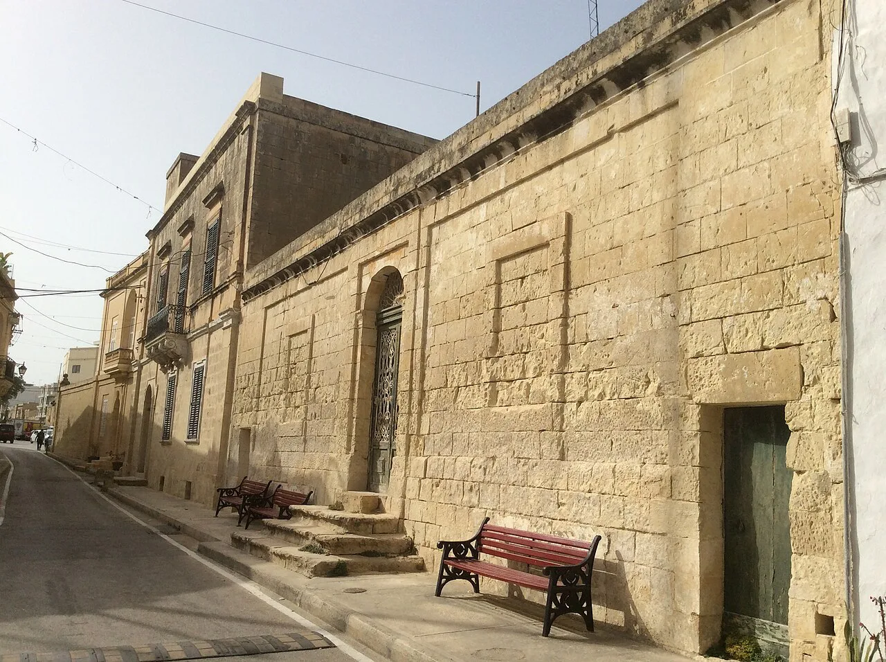 A quiet street of limestone houses in Attard.