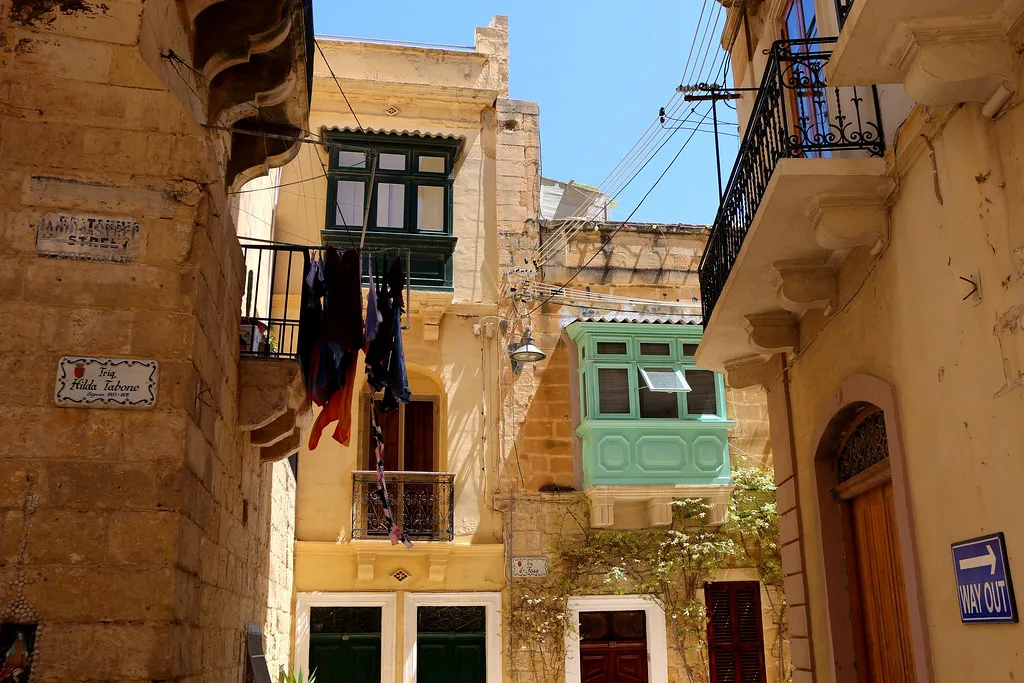 A narrow street of honey-coloured houses in Birgu.