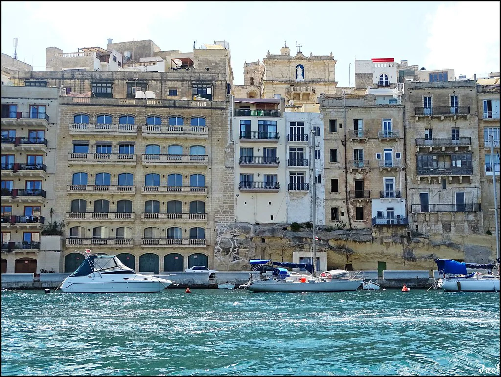 Waterfront buildings at Birgu across the harbour.