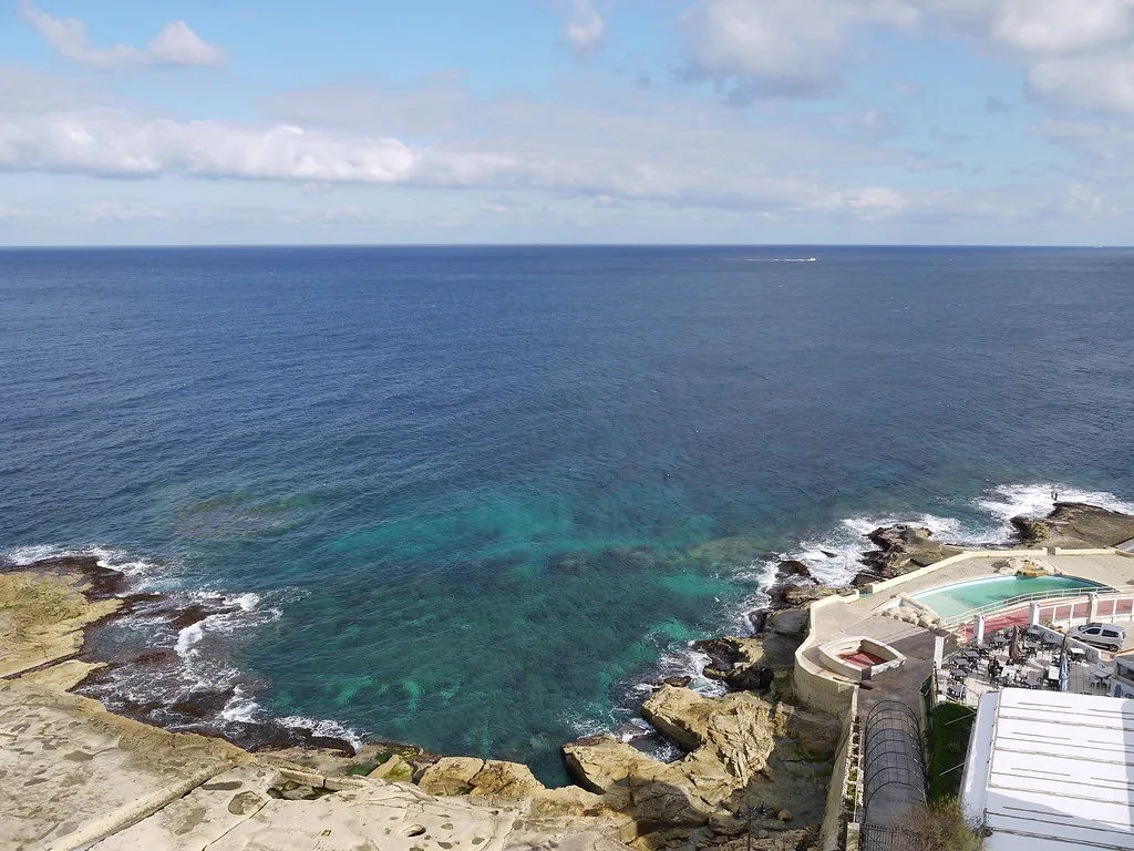 The coast and a seafront lido at Sliema.