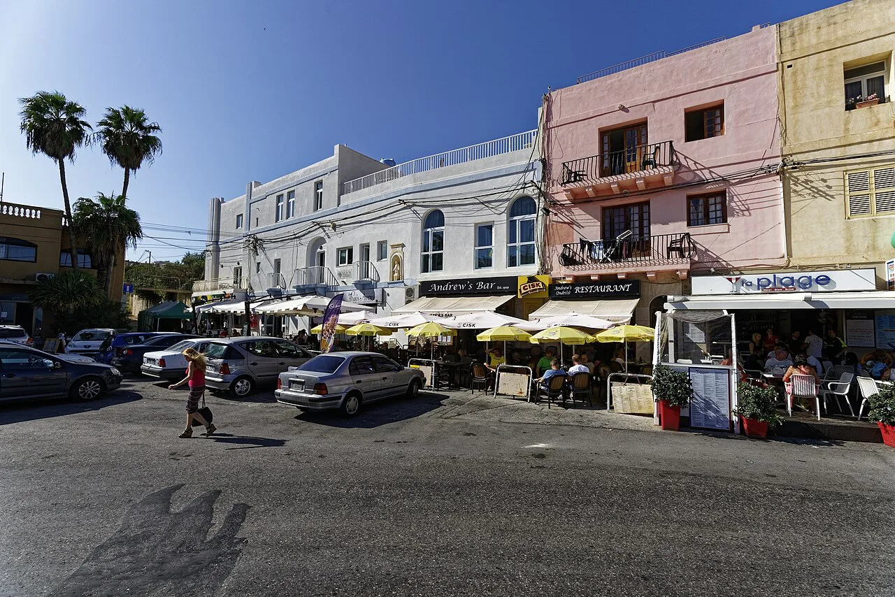 Cafés and restaurants along the waterfront road in St Julian's.