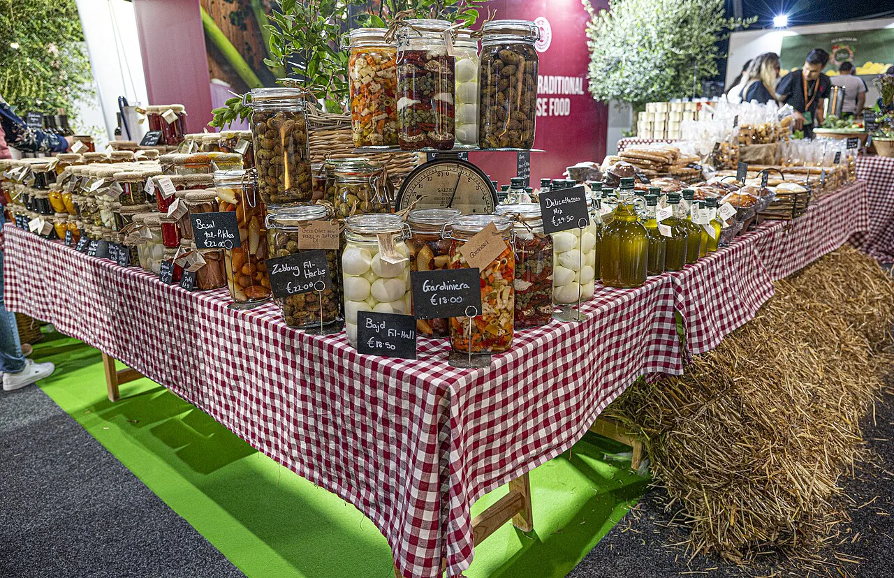 Traditional Maltese preserves and produce on a market stall.
