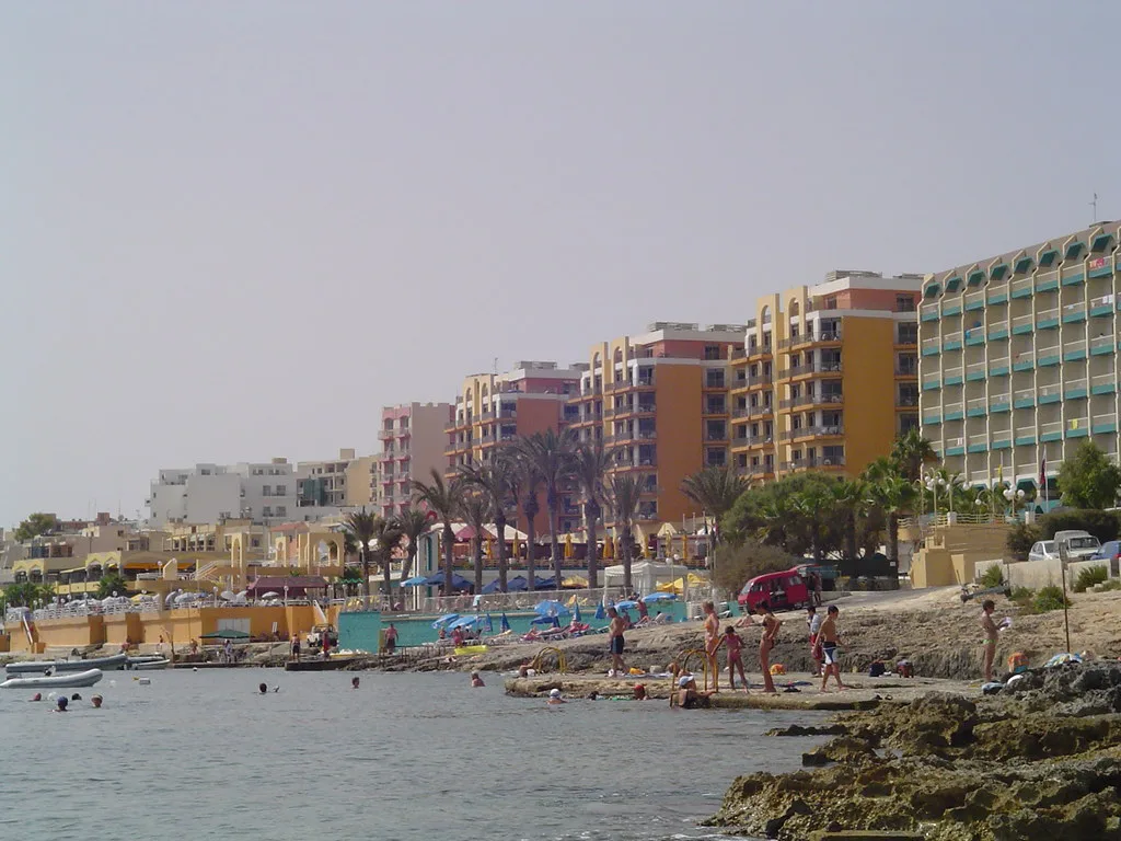 Seafront hotels and the shore at Qawra, next to Buġibba.