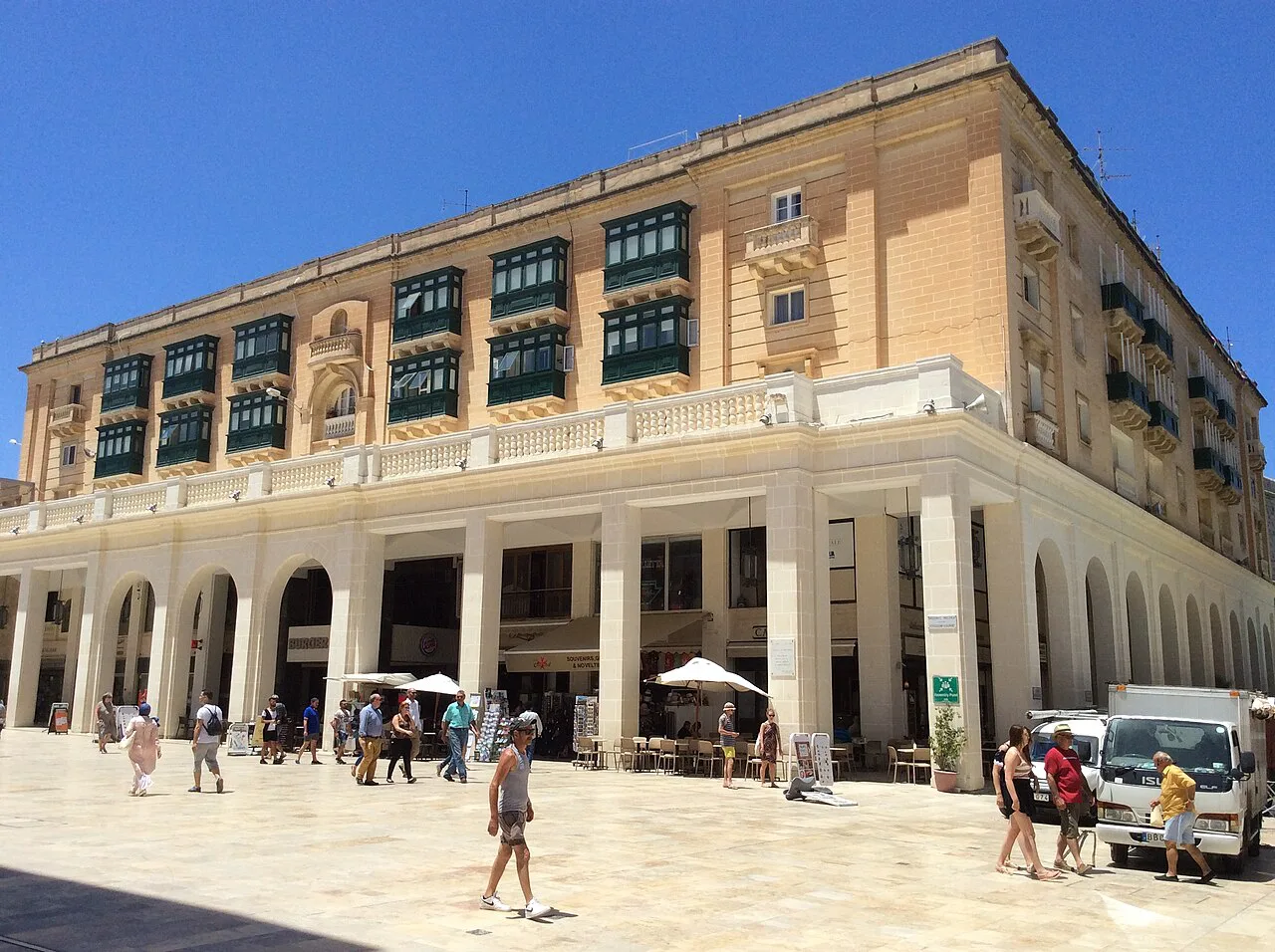 The arcaded buildings beside Valletta's City Gate.