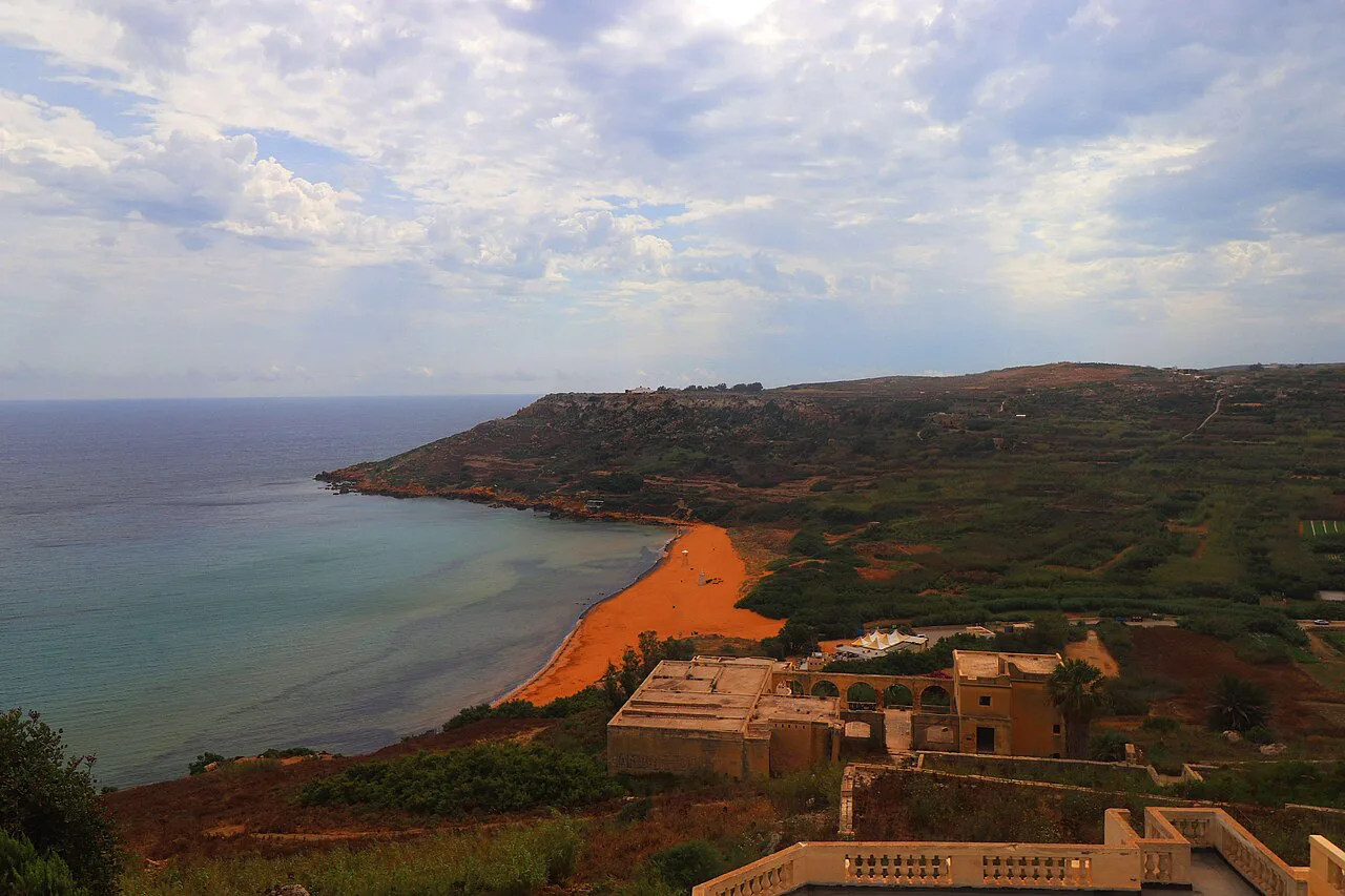 Ramla Bay and its red sand seen from the cliffs near Calypso's Cave, Gozo.