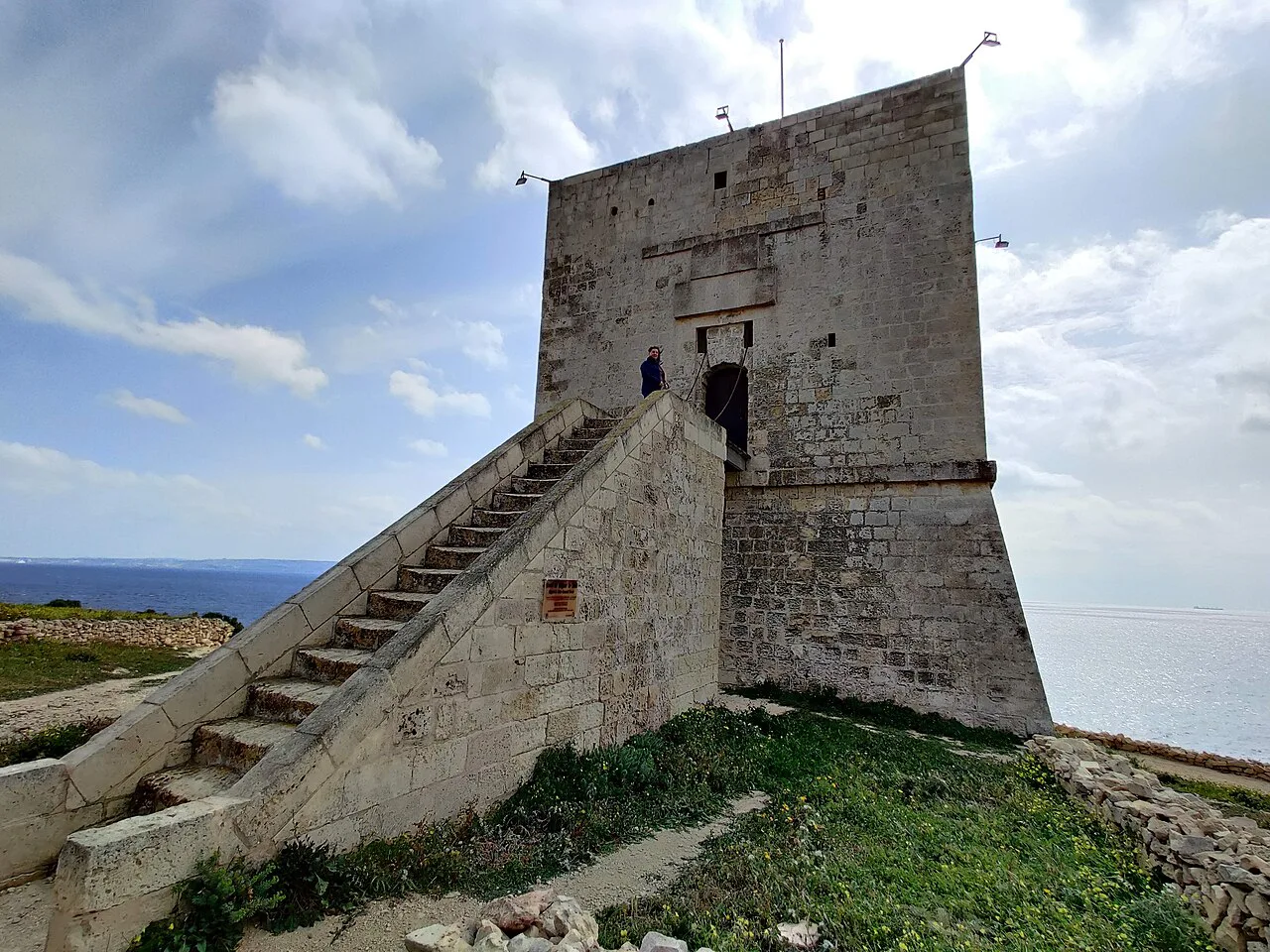 Mġarr ix-Xini Tower on Gozo's coast, a related watchtower near Calypso's Cave.