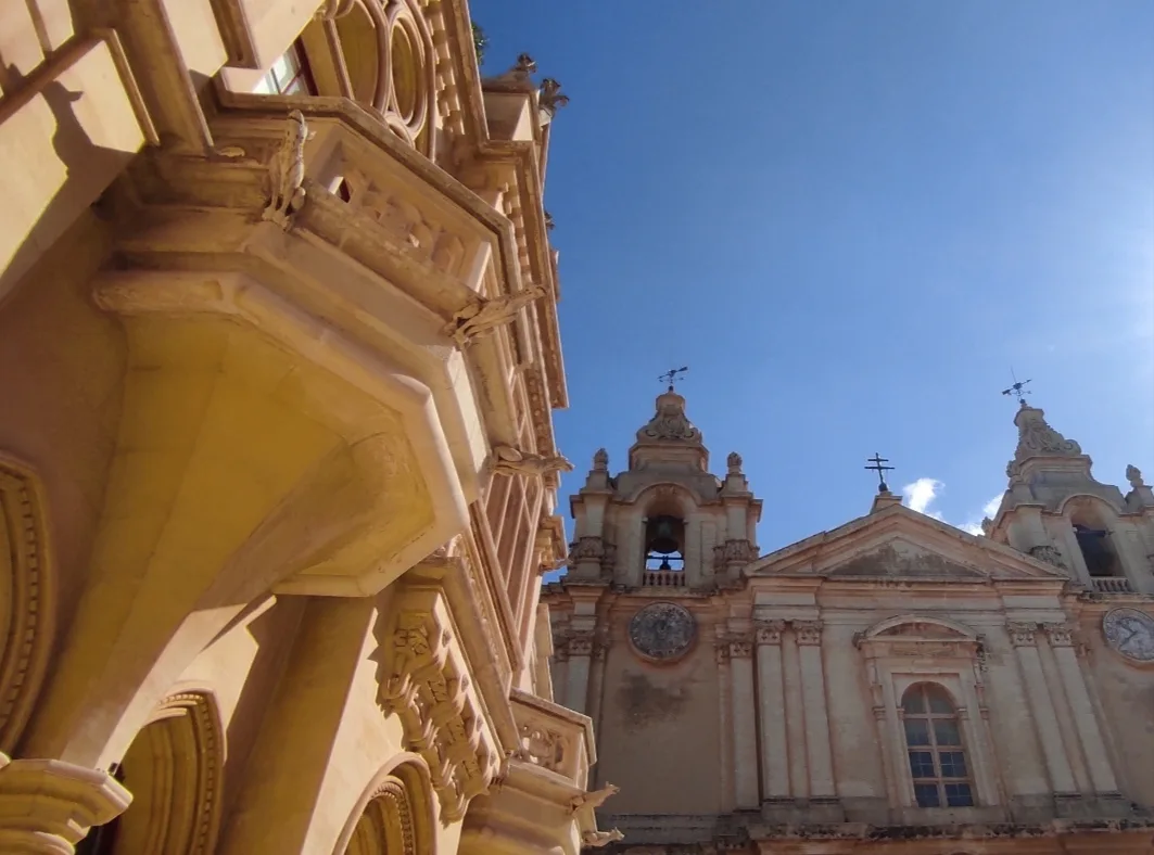Casa Gourgion with the dome of St Paul's Cathedral behind it in Mdina.