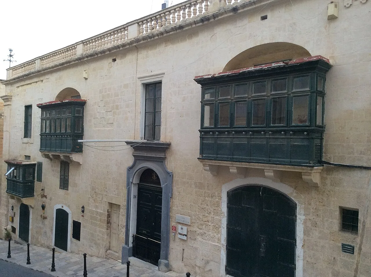 The balconied house frontage of Casa Rocca Piccola in Valletta.