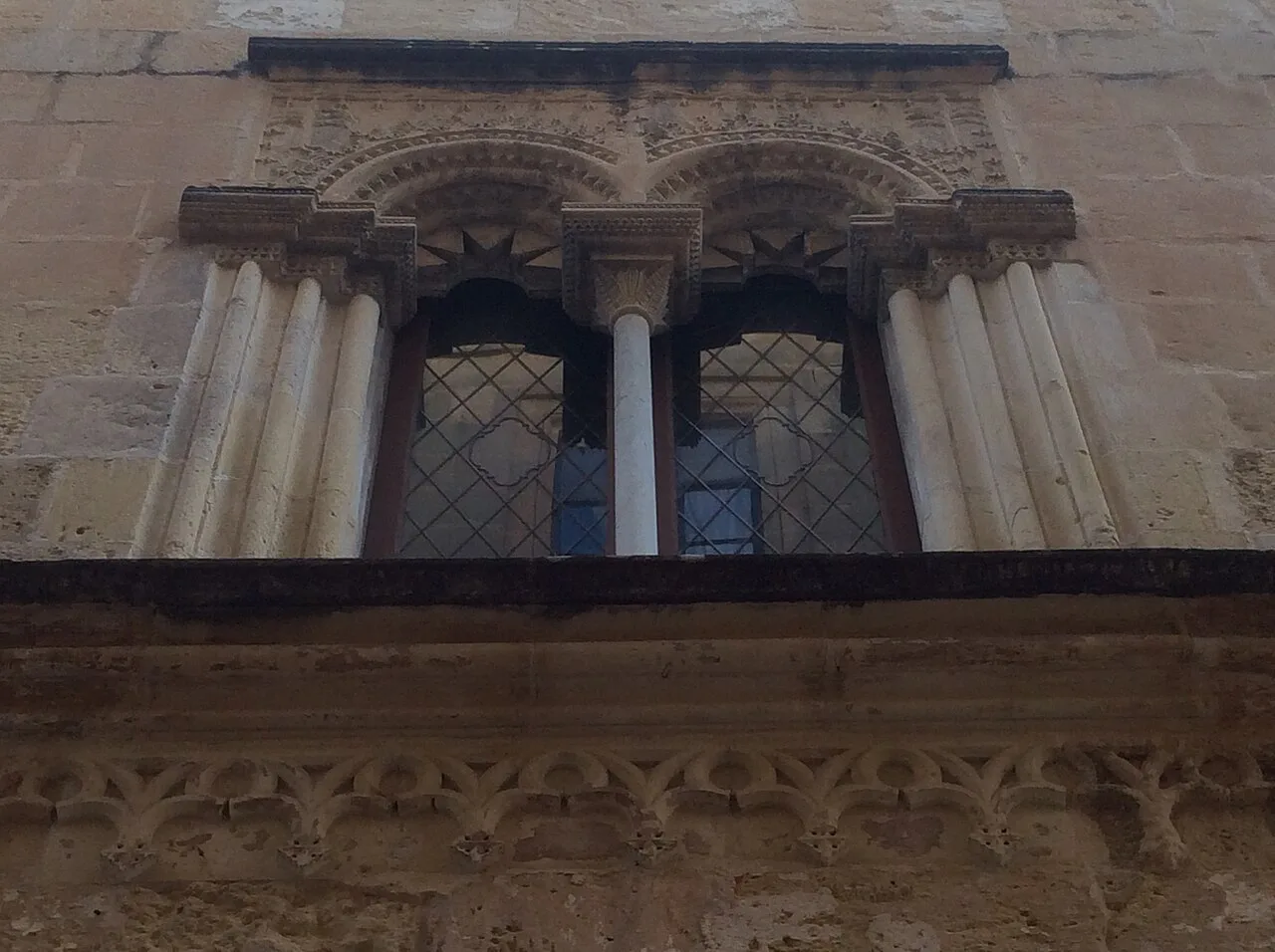 Gothic-style windows of the Norman House in Birgu.