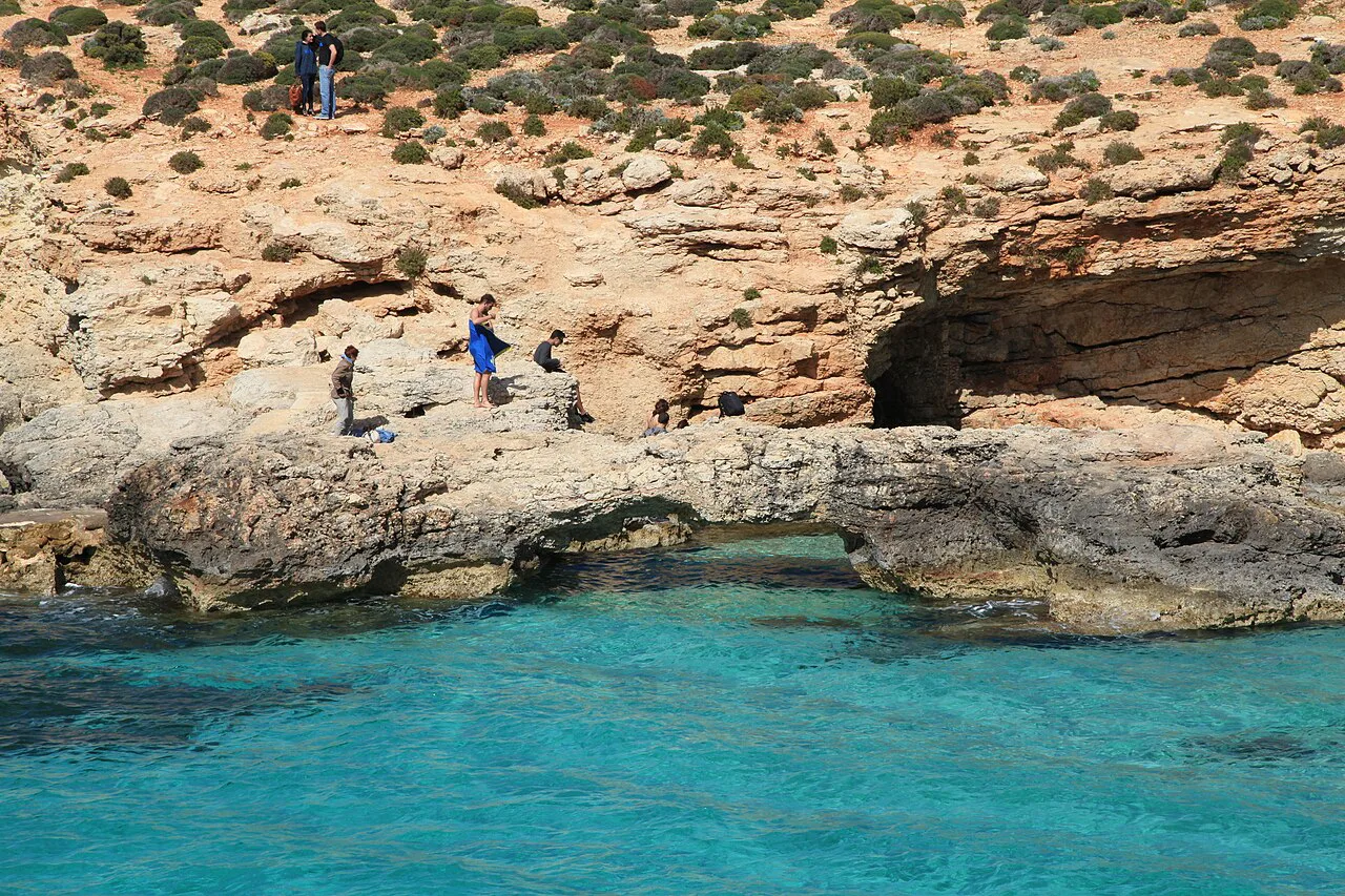 Turquoise water and rocky shore at the Blue Lagoon, Comino.