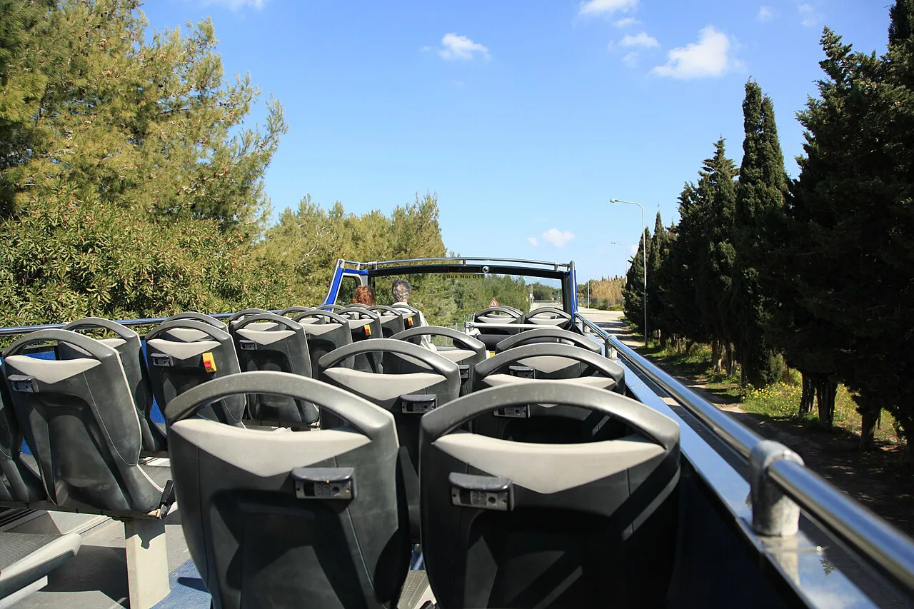 Open-top seating on a sightseeing bus near Attard.