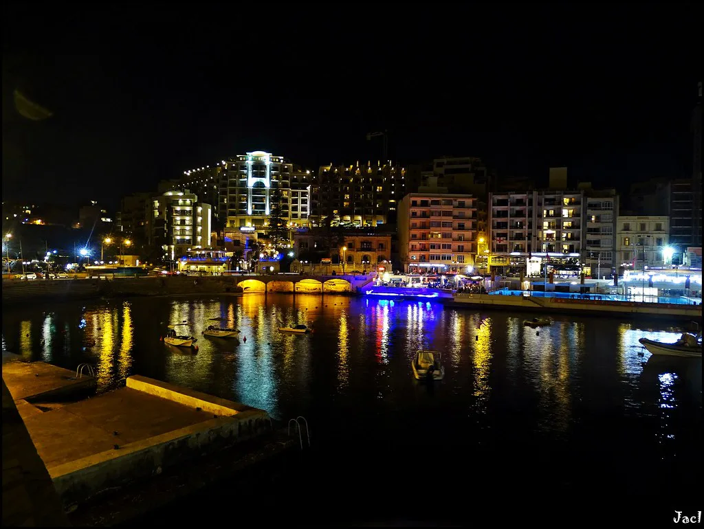 St Julian's waterfront lit up at night.