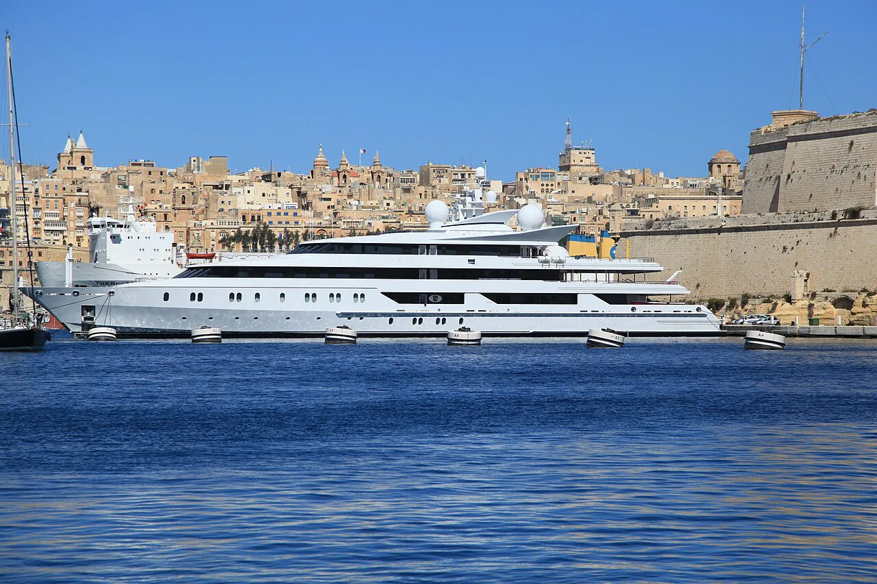 A superyacht moored at Kalkara beside the walls of Fort St Angelo.