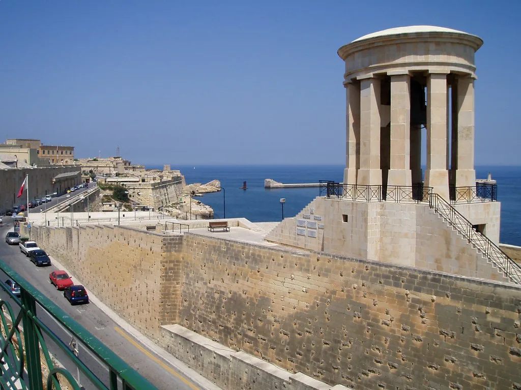 The Siege Bell Memorial seen from Lower Barrakka Gardens.