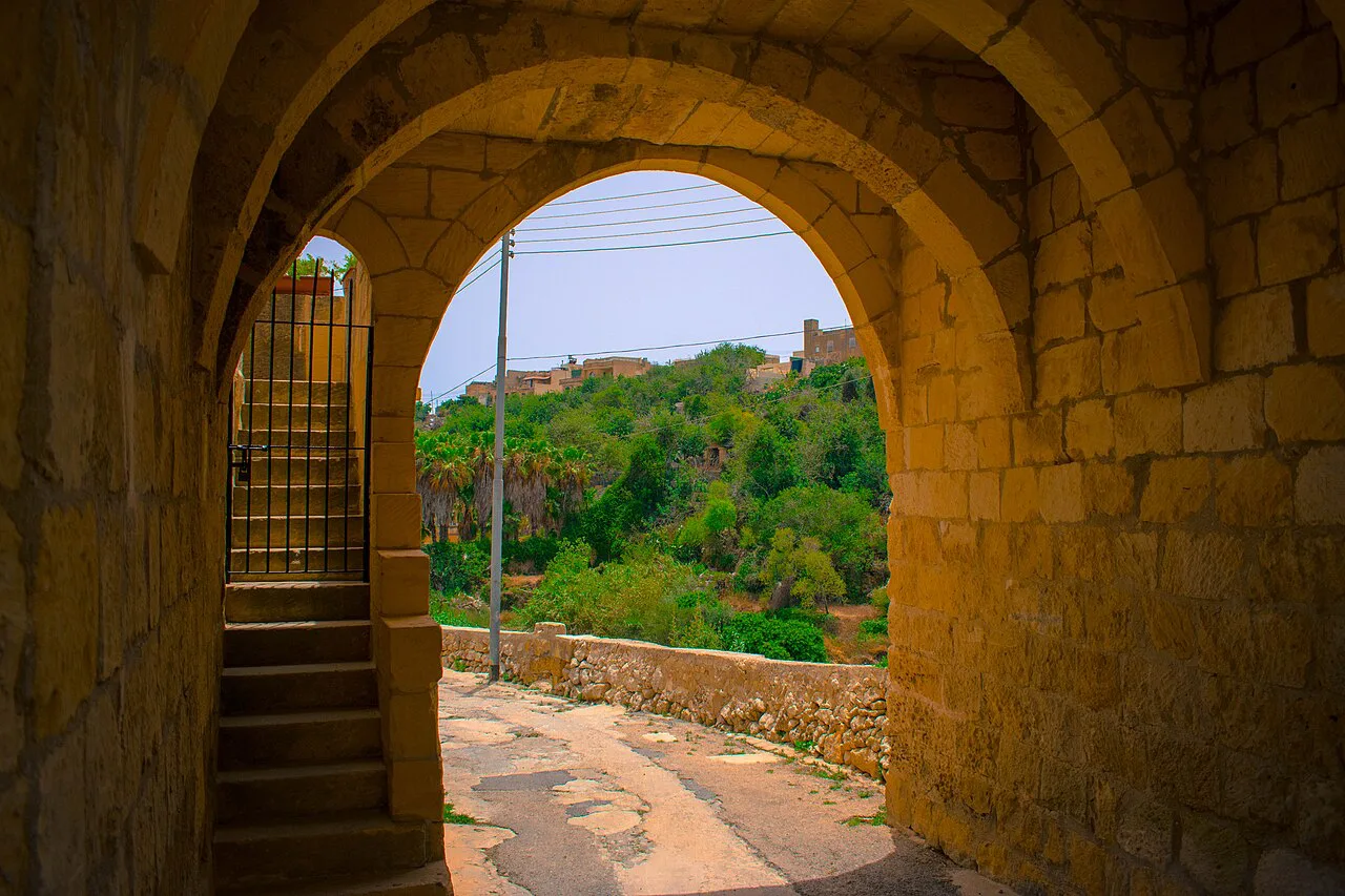 An arched entrance to Lunzjata Valley on Gozo.