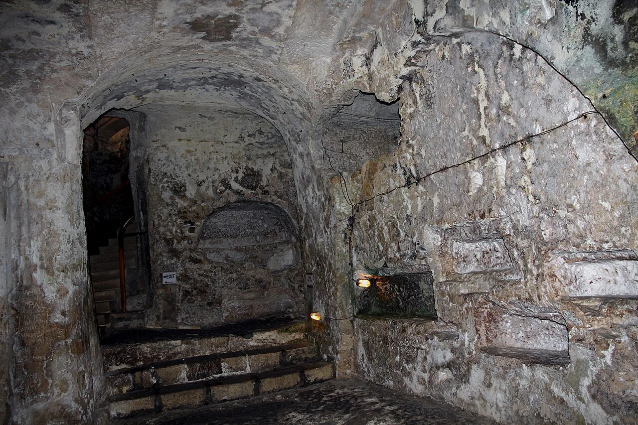 A rock-cut tomb corridor in St Paul's Catacombs, Rabat.