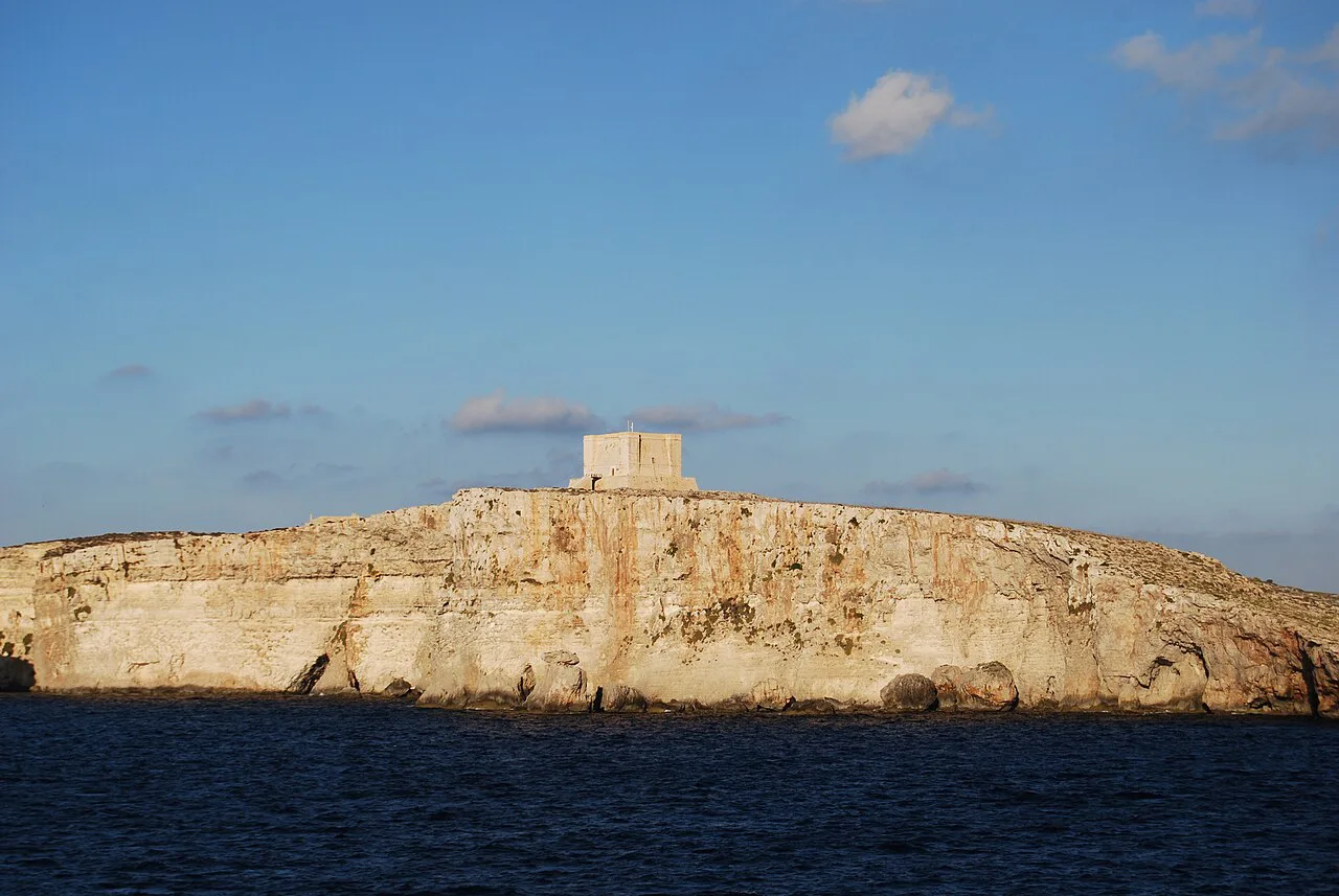 The island of Comino and its tower seen from the sea.