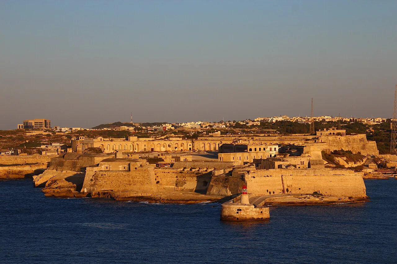 Fort Ricasoli glowing at sunset in Kalkara.