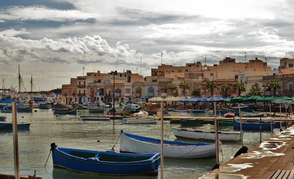 Boats moored in Marsaxlokk harbour.