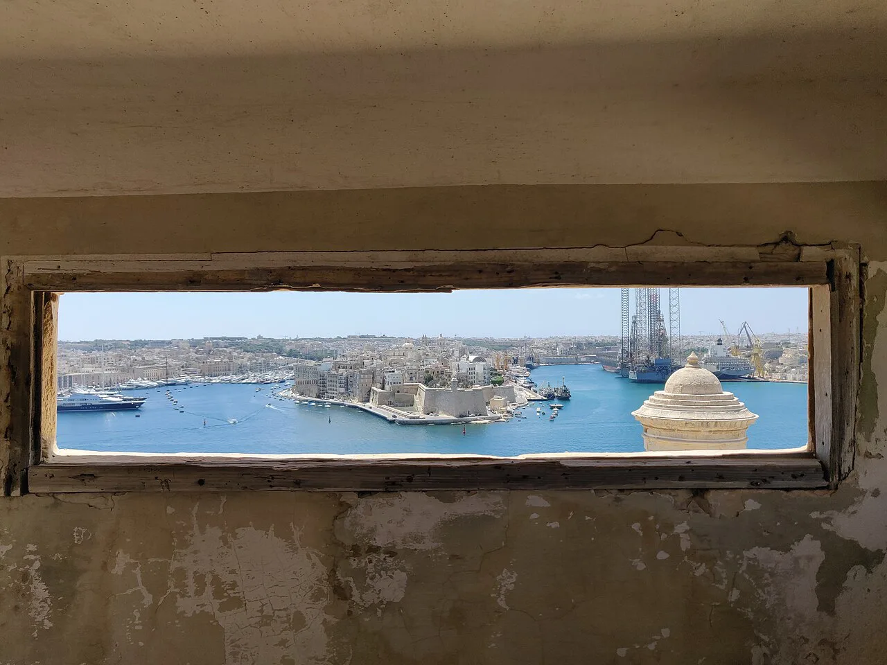 A view of the harbour from a wartime embrasure in Valletta's fortifications.