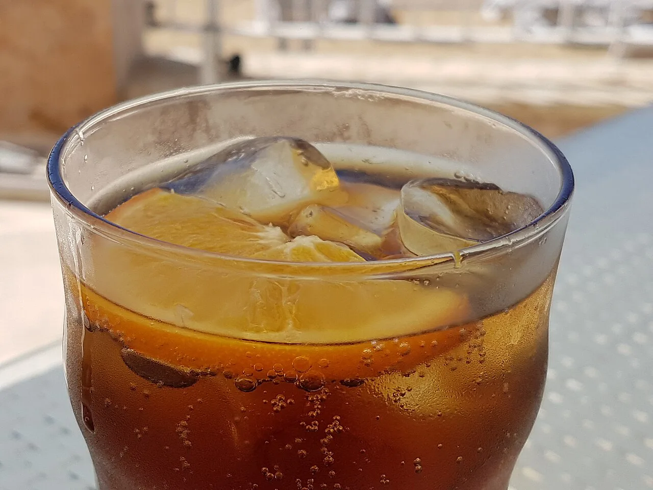 Kinnie, Malta's bitter-orange soft drink, served over ice.