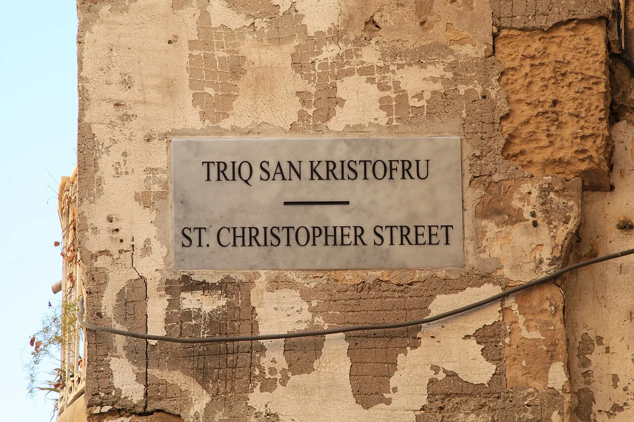 A bilingual Maltese and English street sign in Valletta.