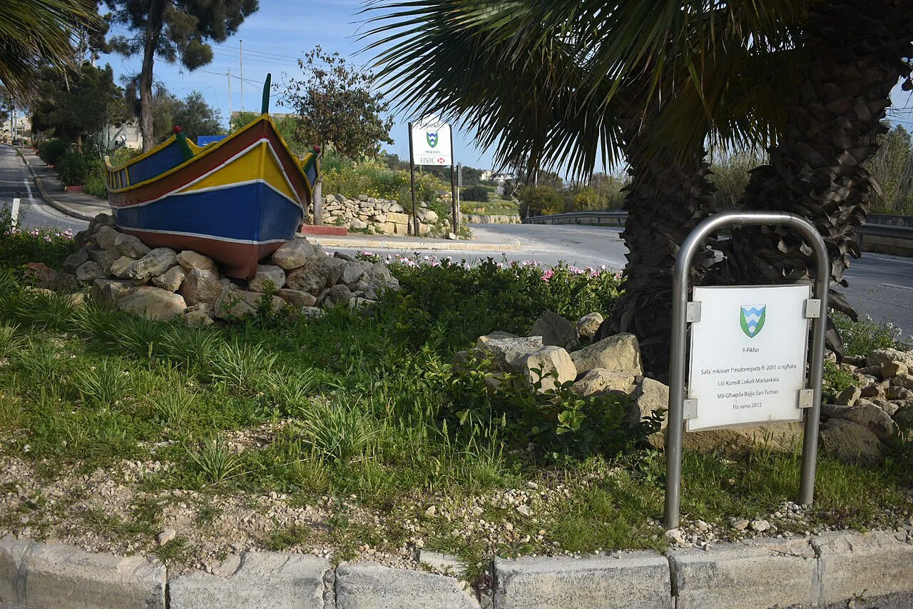 A painted luzzu boat display in Marsaskala.