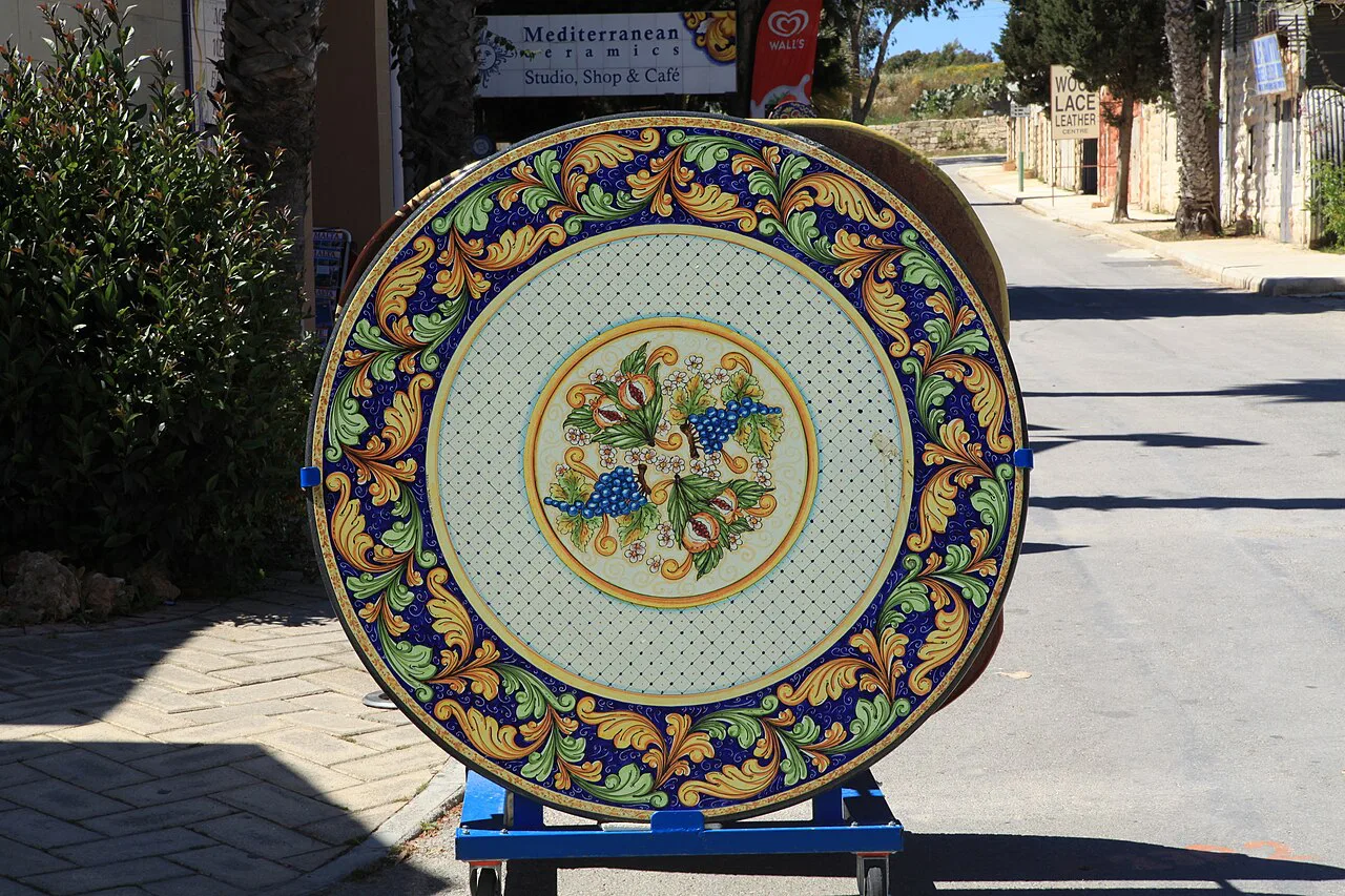A decorative ceramic plate outside a Ta' Qali Crafts Village workshop.
