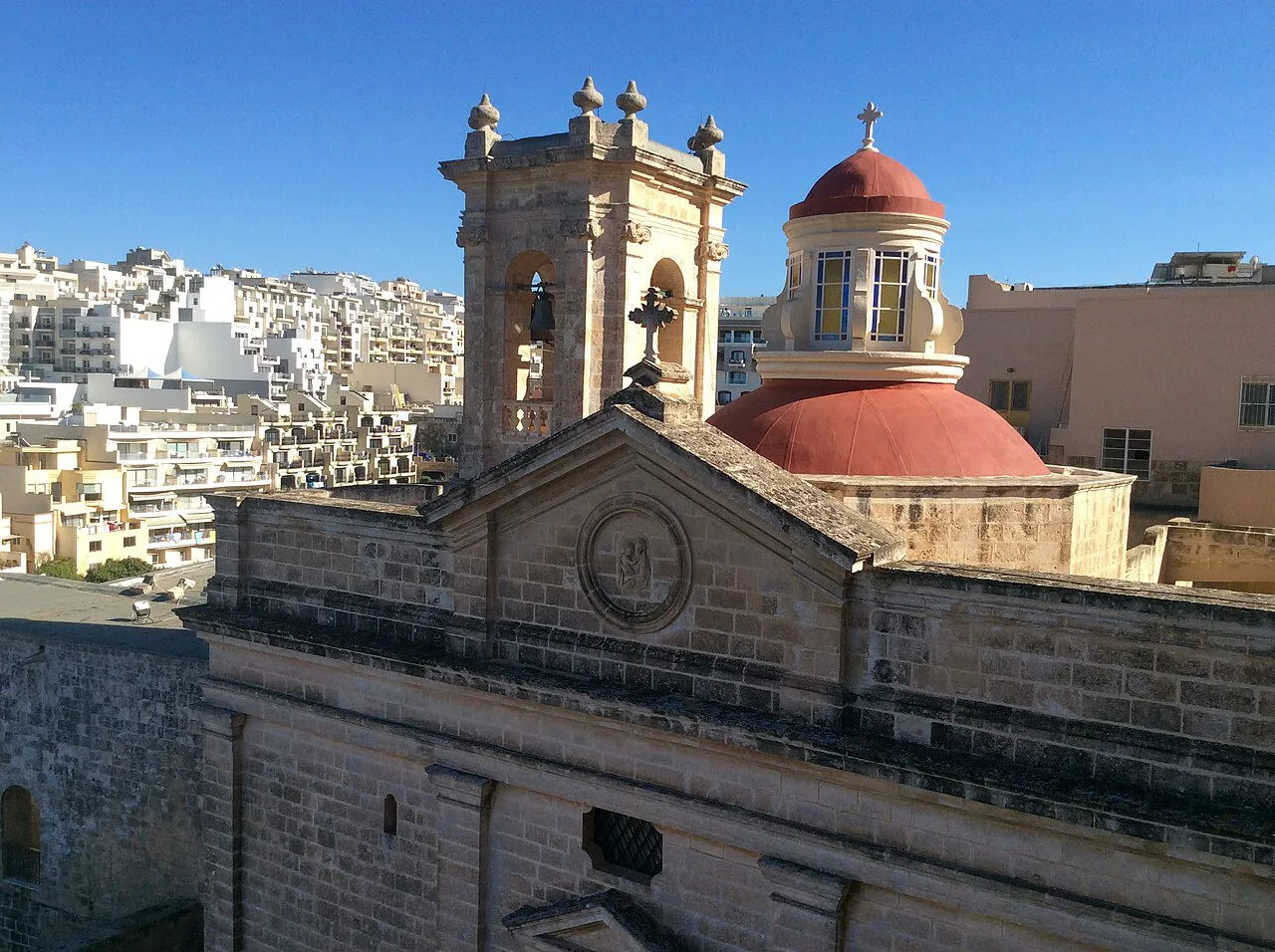 The Sanctuary of Our Lady of Mellieħa with its red dome.
