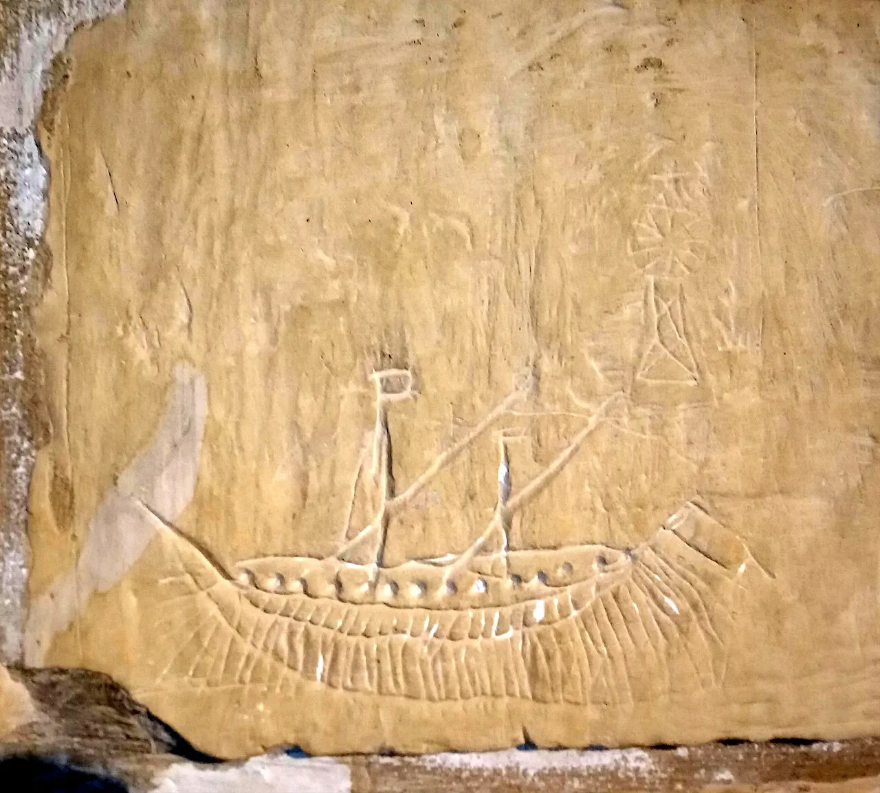 A graffito of a ship carved into the wall of the Old Prison in Victoria, Gozo.