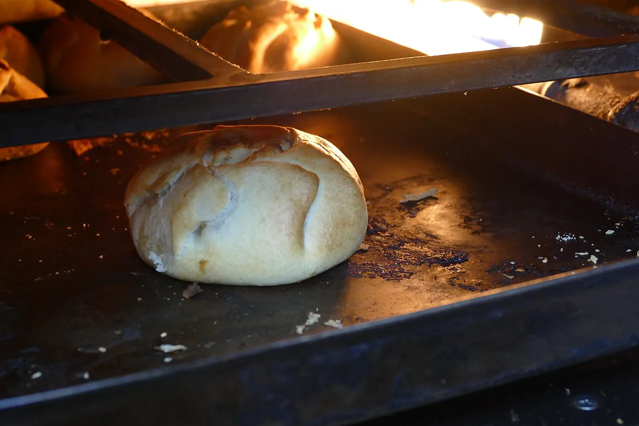 A qassata baking in the oven.