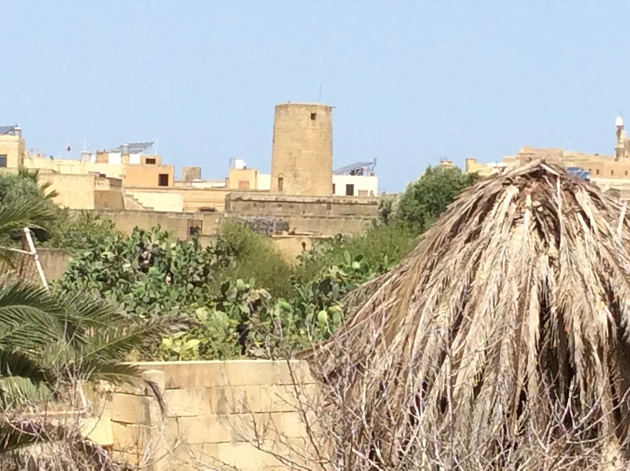 Rooftops and a tower on the edge of Victoria, Gozo.