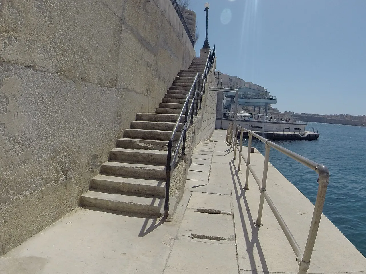 Steps down to the water on the Tas-Sliema seafront.