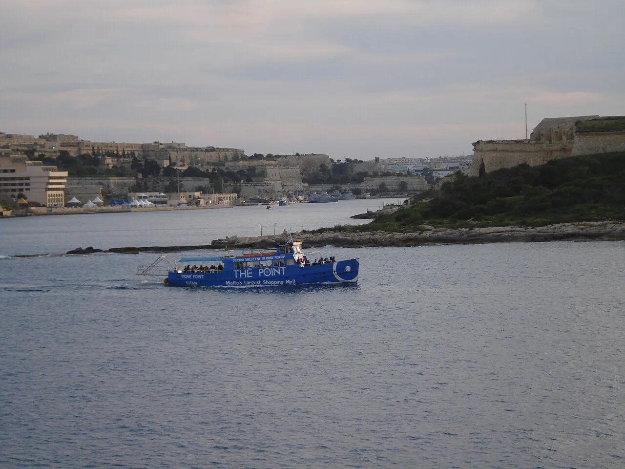 The ferry crossing Marsamxett Harbour near Sliema Creek.