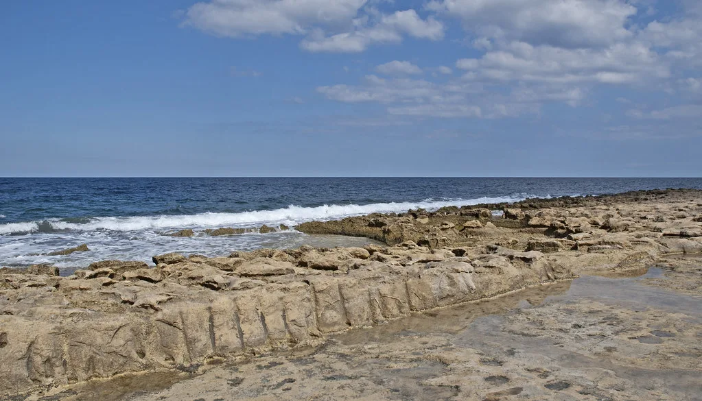 The rocky shoreline at Sliema.