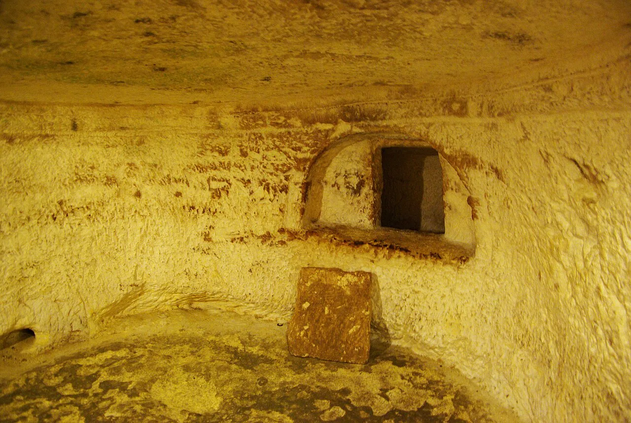 A rock-cut niche in the catacombs at Rabat.