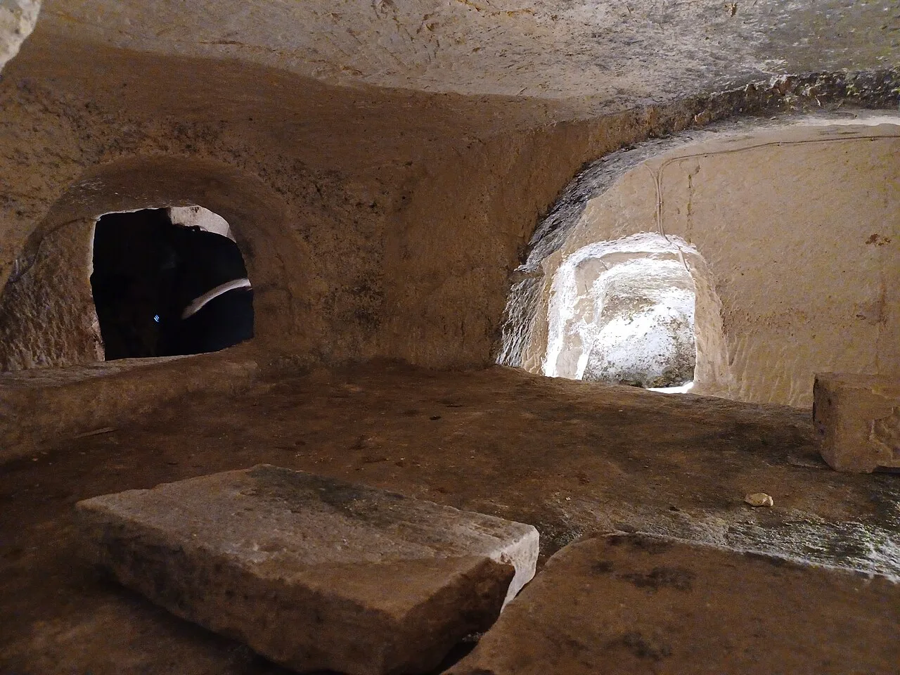 Rock-cut chambers in the catacombs beneath the Wignacourt Museum in Rabat.