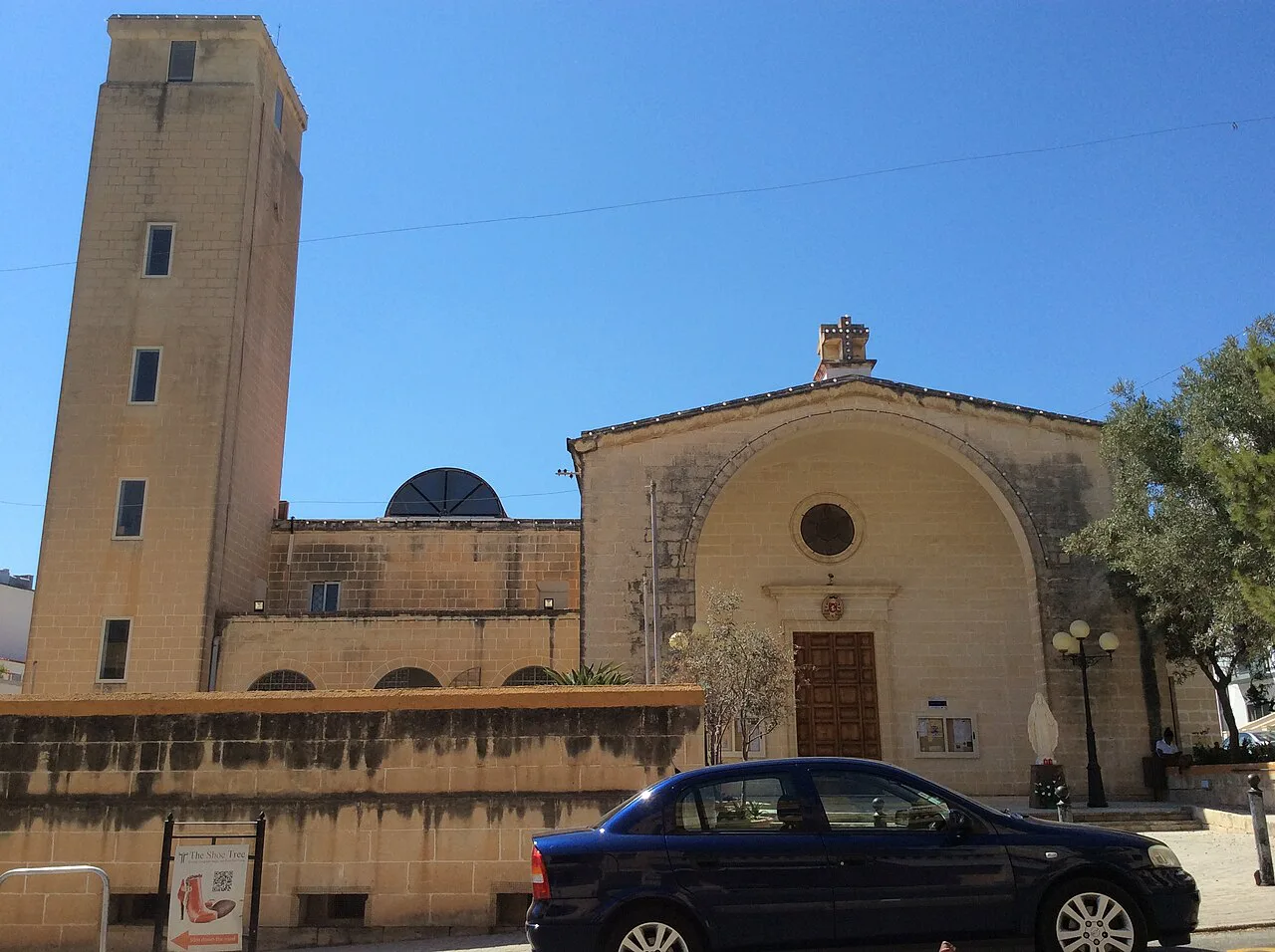 A church and its bell tower in Swieqi.