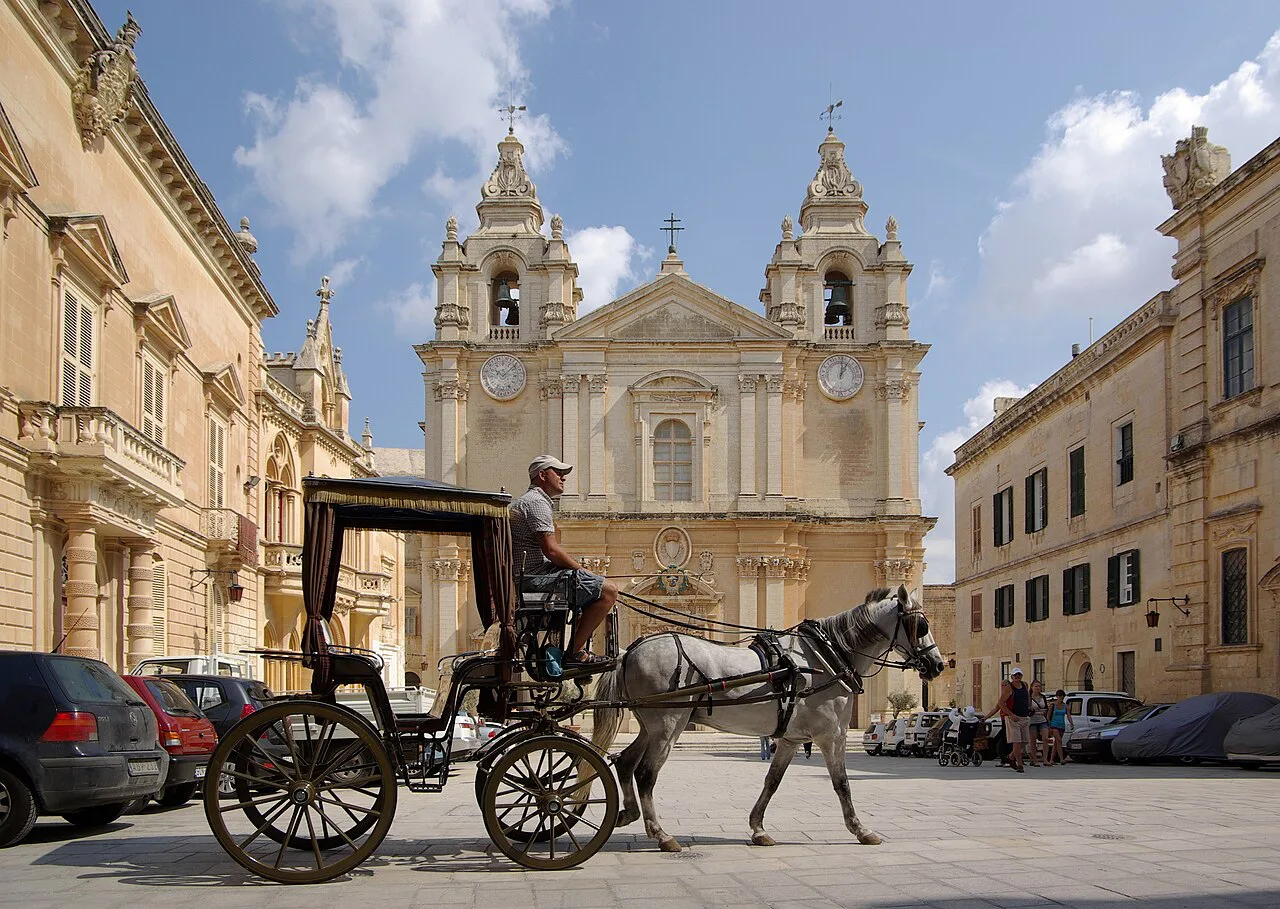 A horse-drawn carriage in front of St Paul's Cathedral in Mdina.