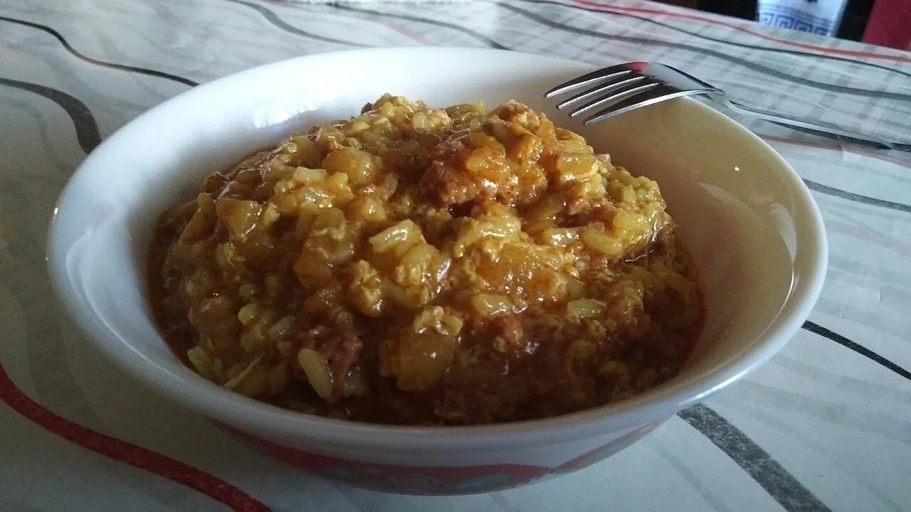 A bowl of Maltese baked rice, one of the island's oven-baked pasta and rice dishes.
