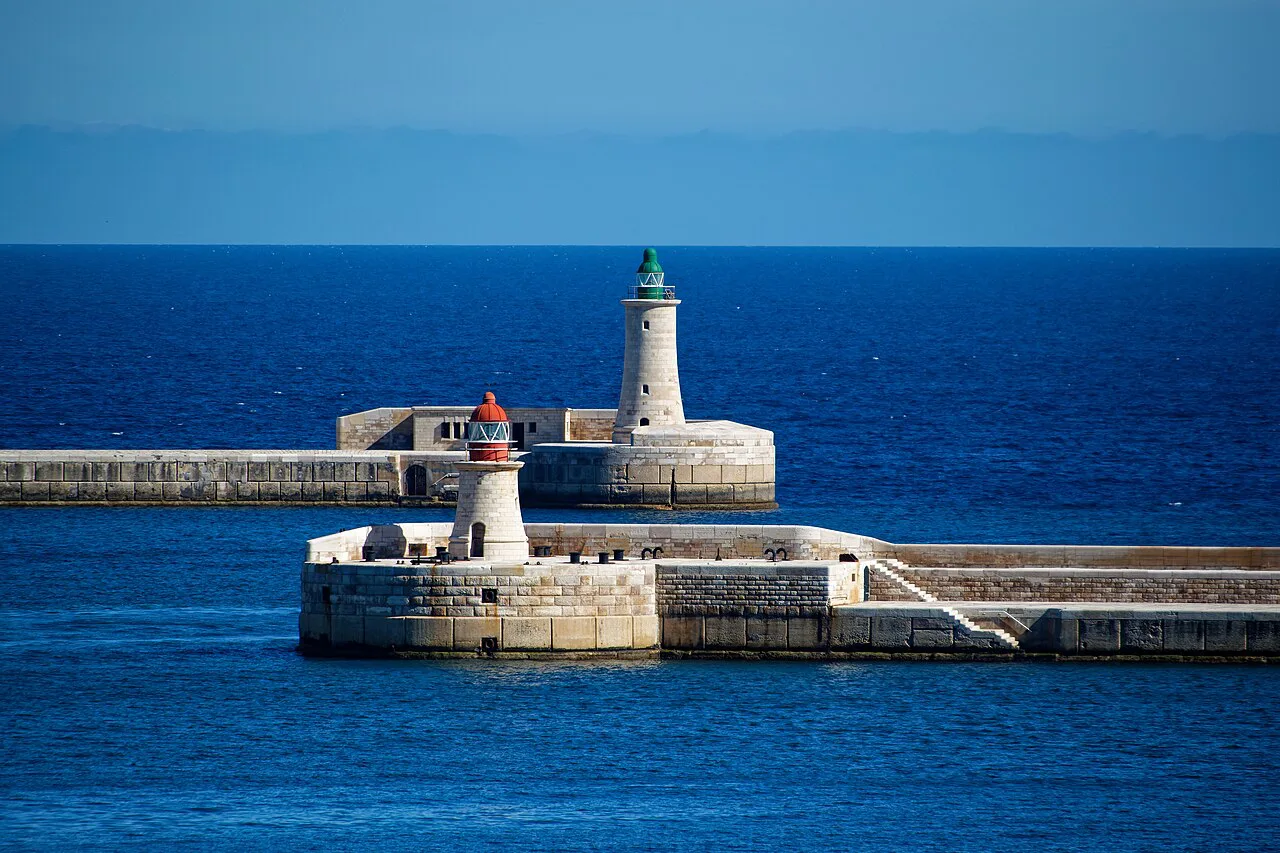 The two breakwater beacons at the entrance to Grand Harbour.