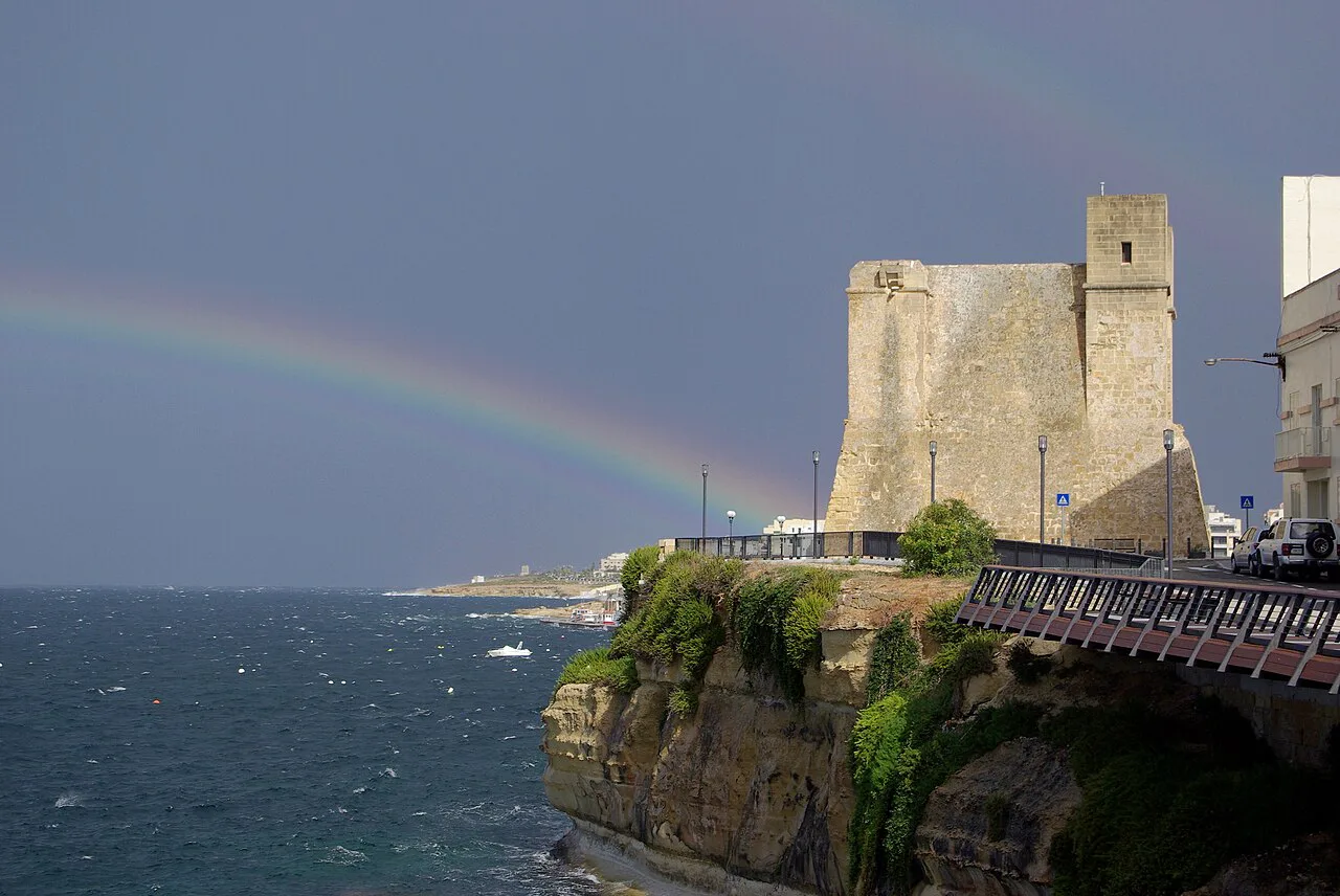 Wignacourt Tower under a rainbow at St Paul's Bay.
