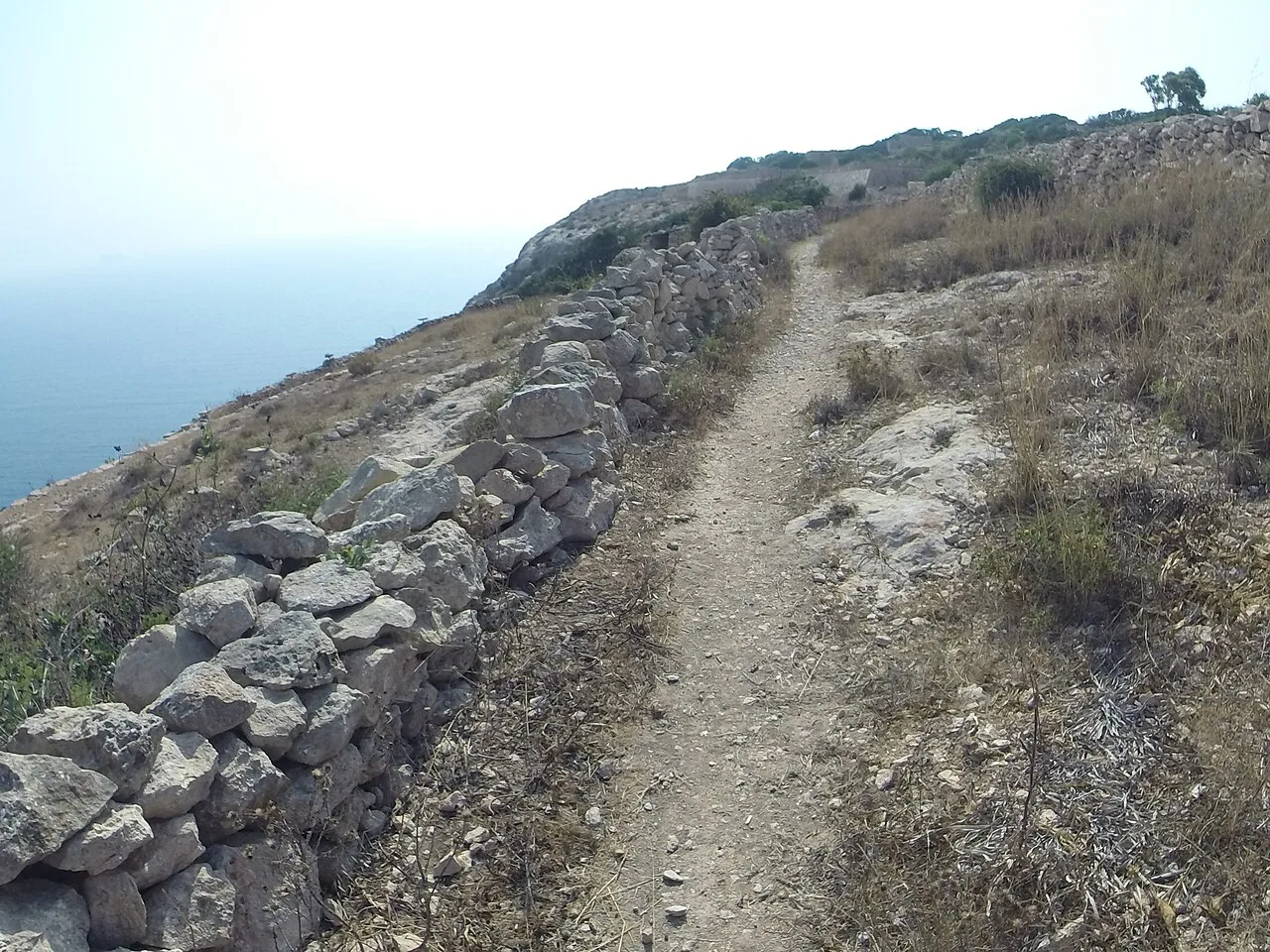 A dry-stone-walled path along the cliffs near Żurrieq.